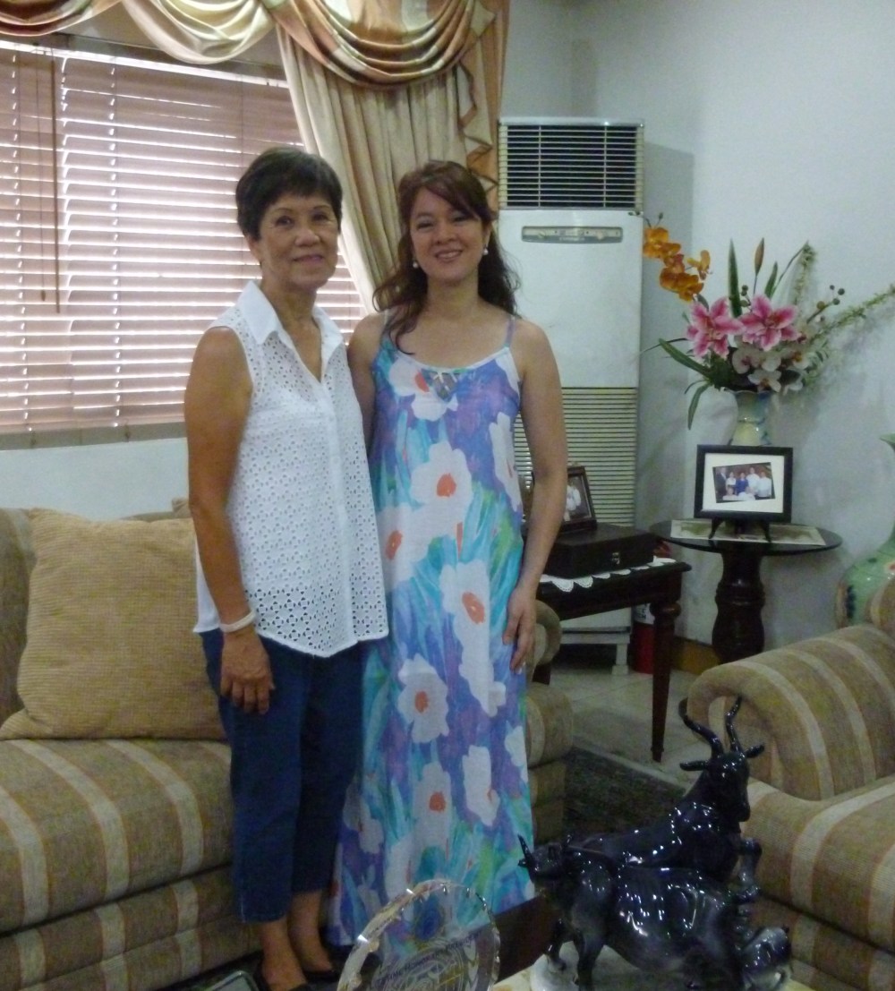 I'm wearing one of my favorite Beso sundresses while visiting with my cousin-in-law, Achi Maribel